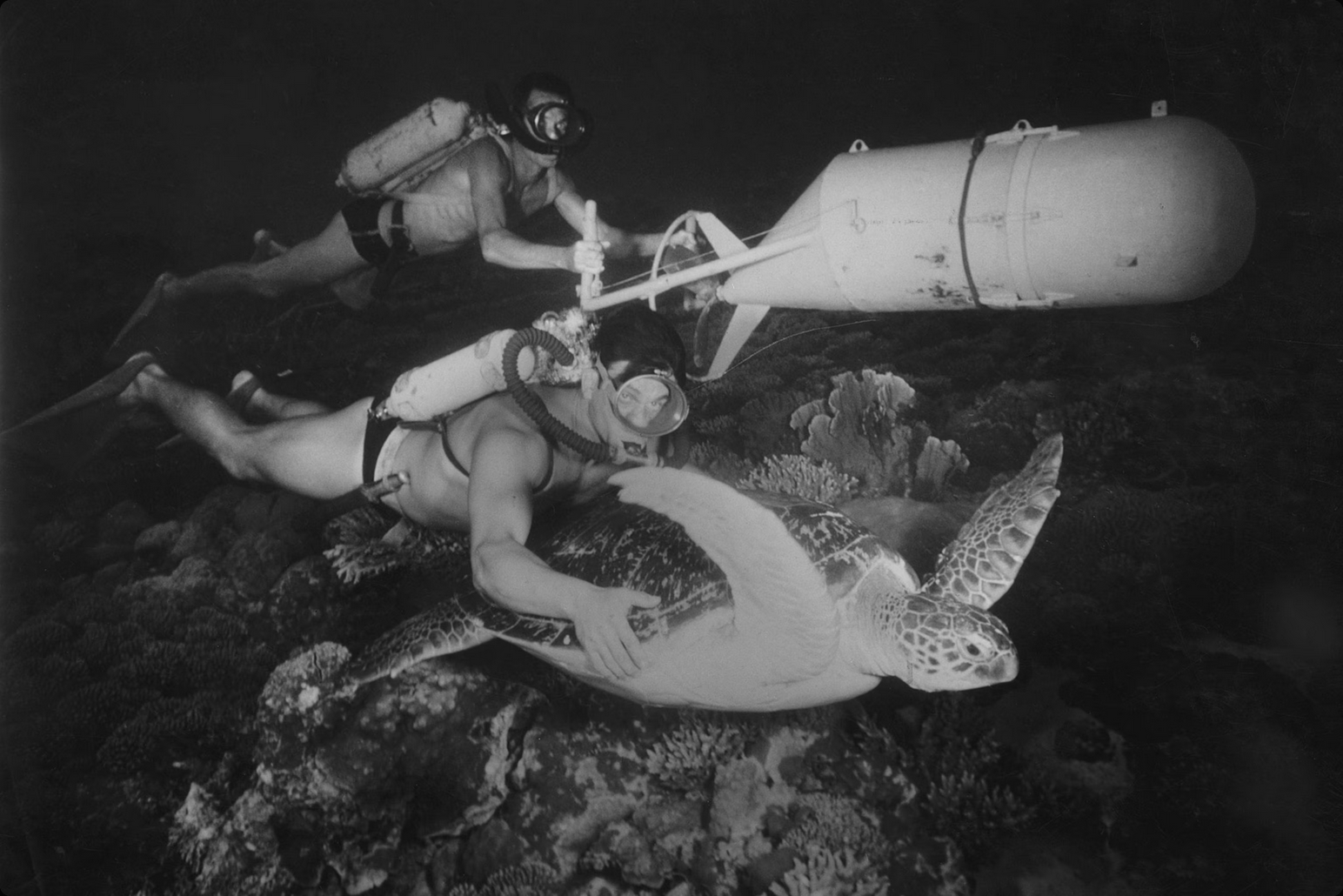 Jacques Cousteau diving, in the period when the ocean stops being merely a chasm observed from the surface and becomes a territory travelled by man.